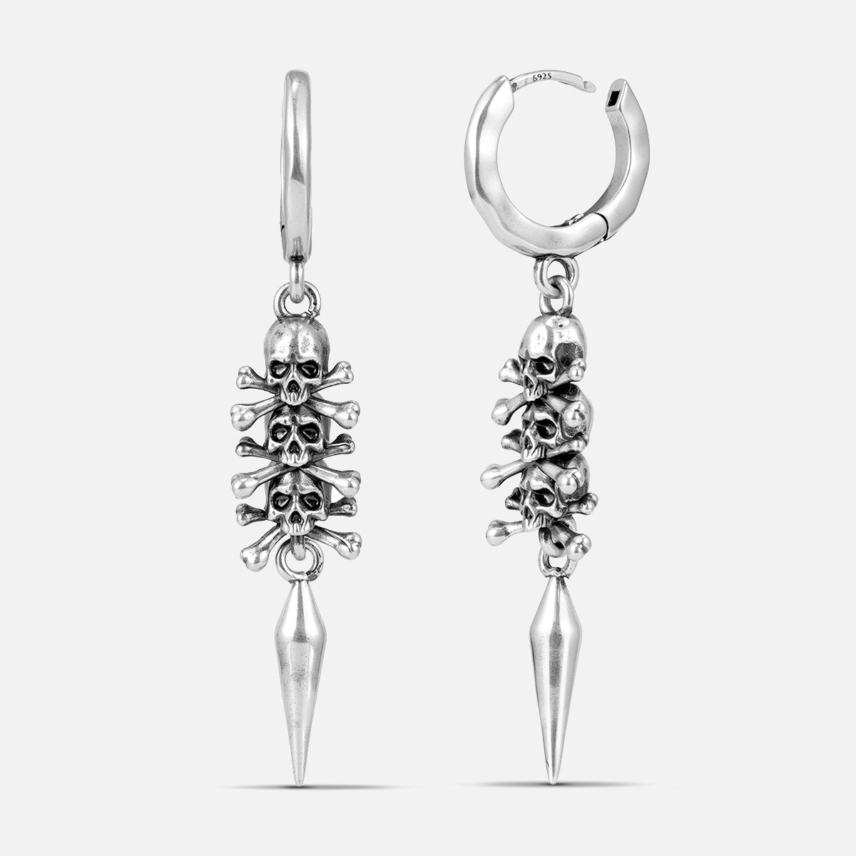 Punkyouth Skull relic earrings in silver, featuring skull-and-crossbones charms and long pointed drops