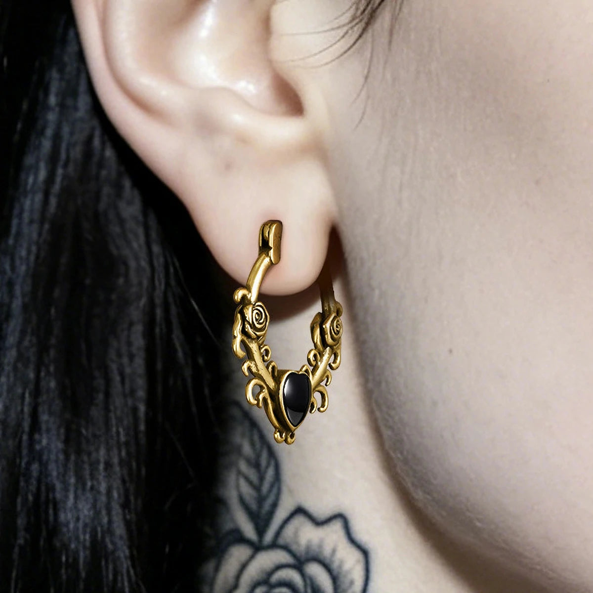 Punkyouth Thornheart earrings featuring sculpted roses and black heart-shaped resin centers, product image 05