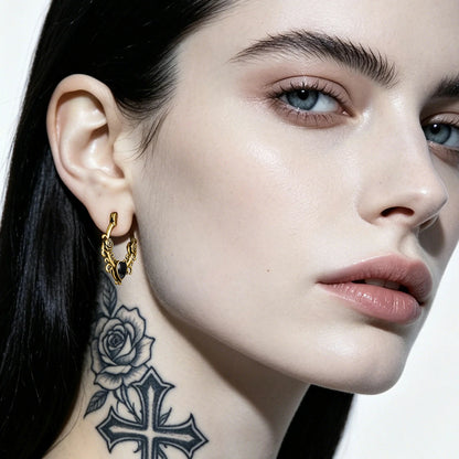 Punkyouth Thornheart earrings featuring sculpted roses and black heart-shaped resin centers, product image 06
