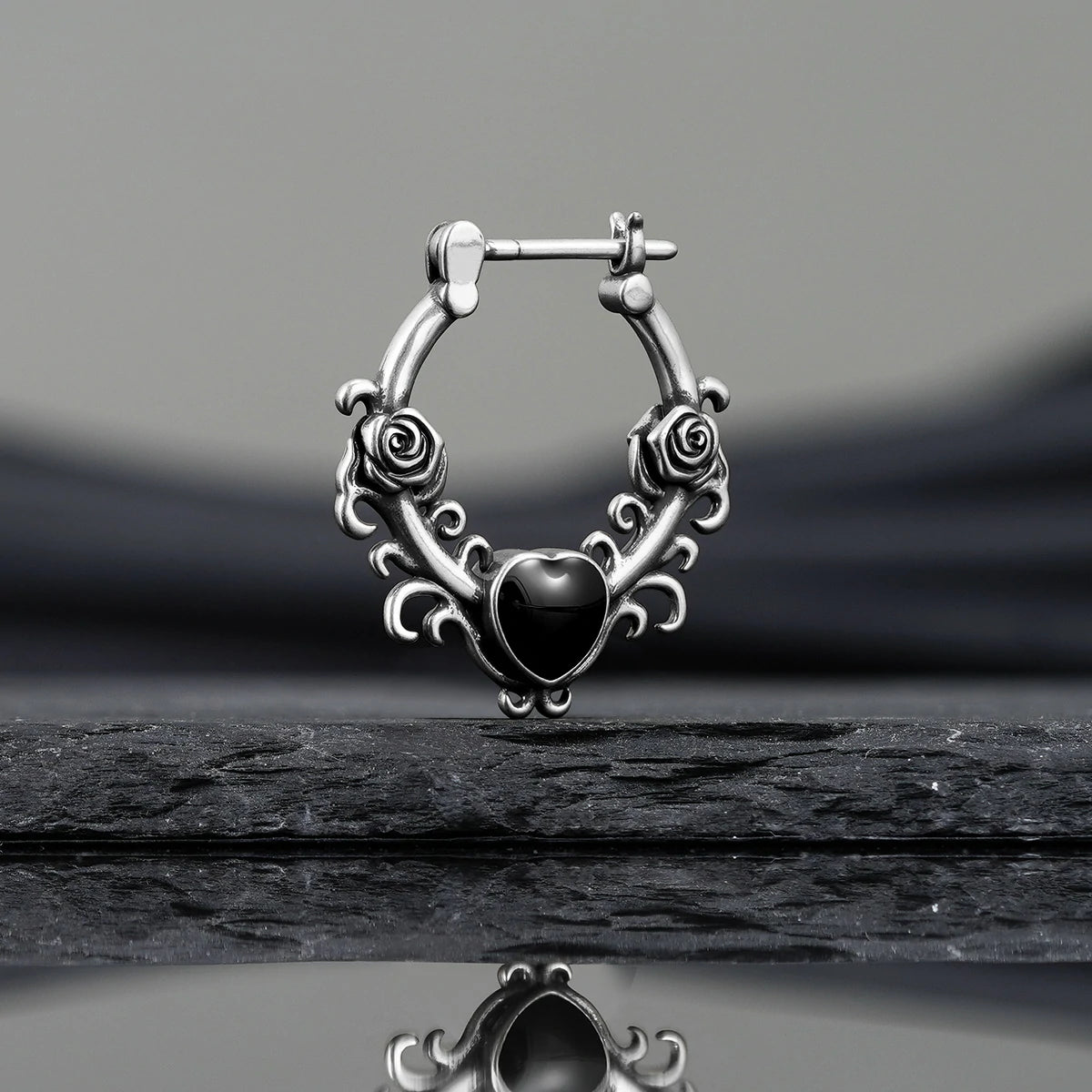 Punkyouth Thornheart earrings featuring sculpted roses and black heart-shaped resin centers, product image 08