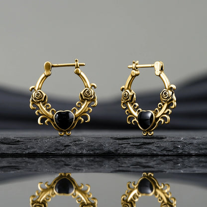 Punkyouth Thornheart earrings featuring sculpted roses and black heart-shaped resin centers, product image 09