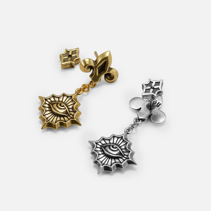 Antiqued silver- and gold-tone Radiant Witness Drop Earrings displayed from angled views to show the medallions and side profiles.