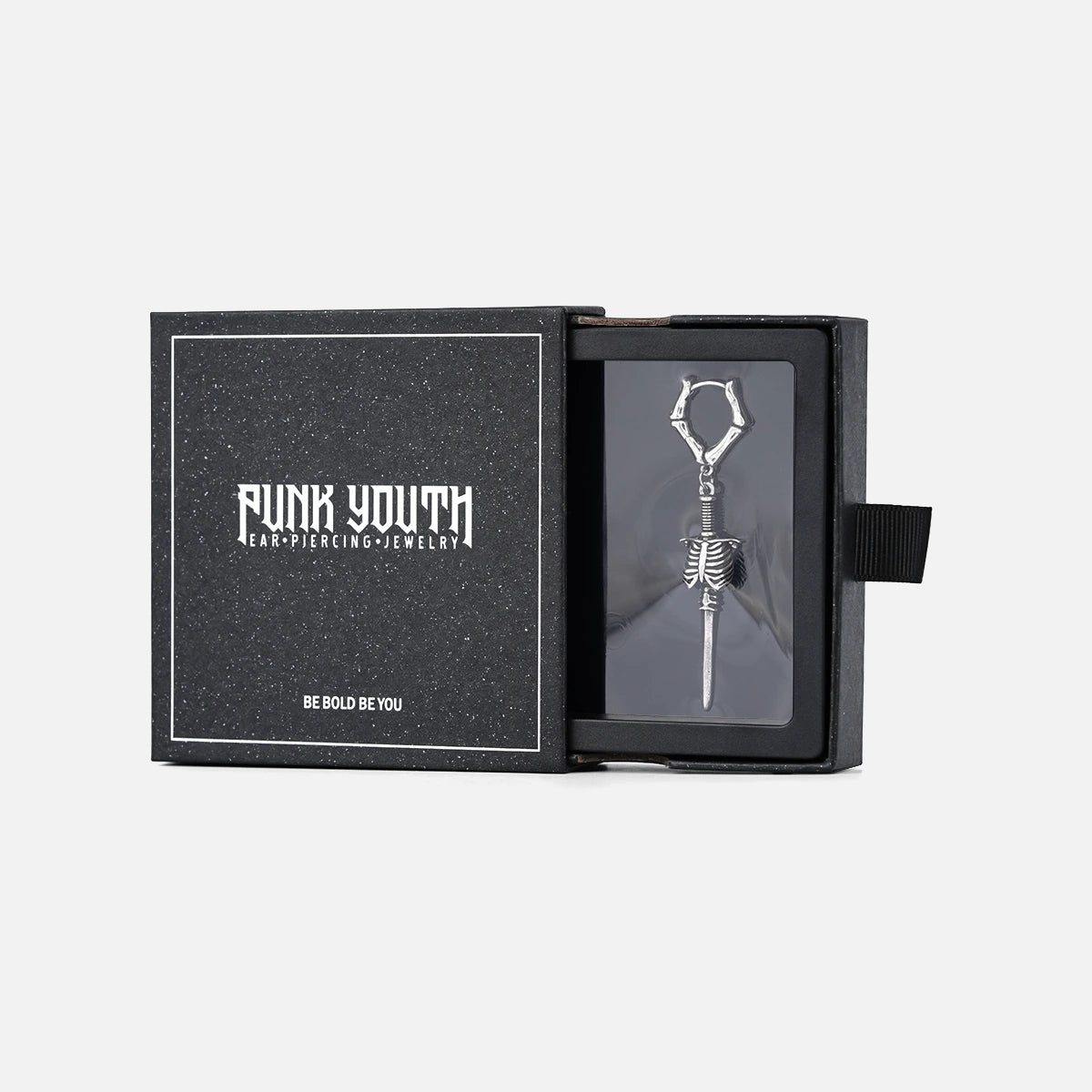 Silver Ribcage Blade earring presented in a black PUNKYOUTH jewelry box