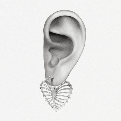 Silver Ribheart earring shown on an ear illustration
