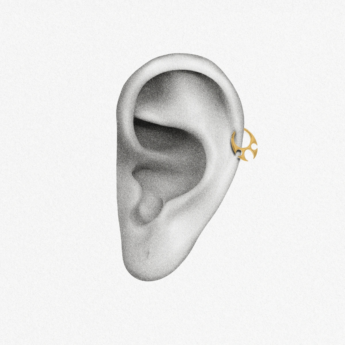 Gold Ritual Claw Clicker shown on ear placement with sculptural triple claw design