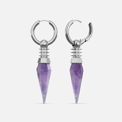 Silver Rivet Prism Earrings with faceted amethyst crystal spikes, studded cylindrical collars, polished hoops, and sharp vertical silhouette on a clean background.