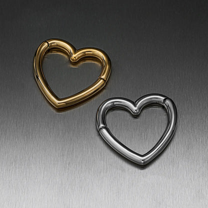 Heart-shaped hinged ear weights in gold-tone and silver-tone finishes, closed views