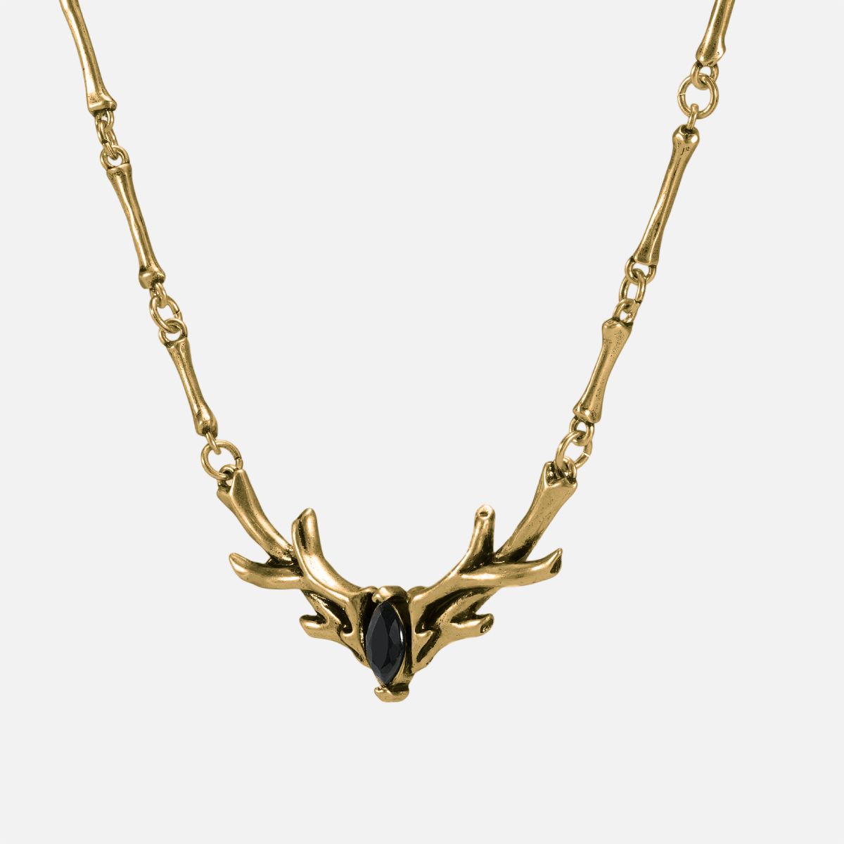 Gold Sacred Antler Collar Necklace with antler motif and obsidian center stone