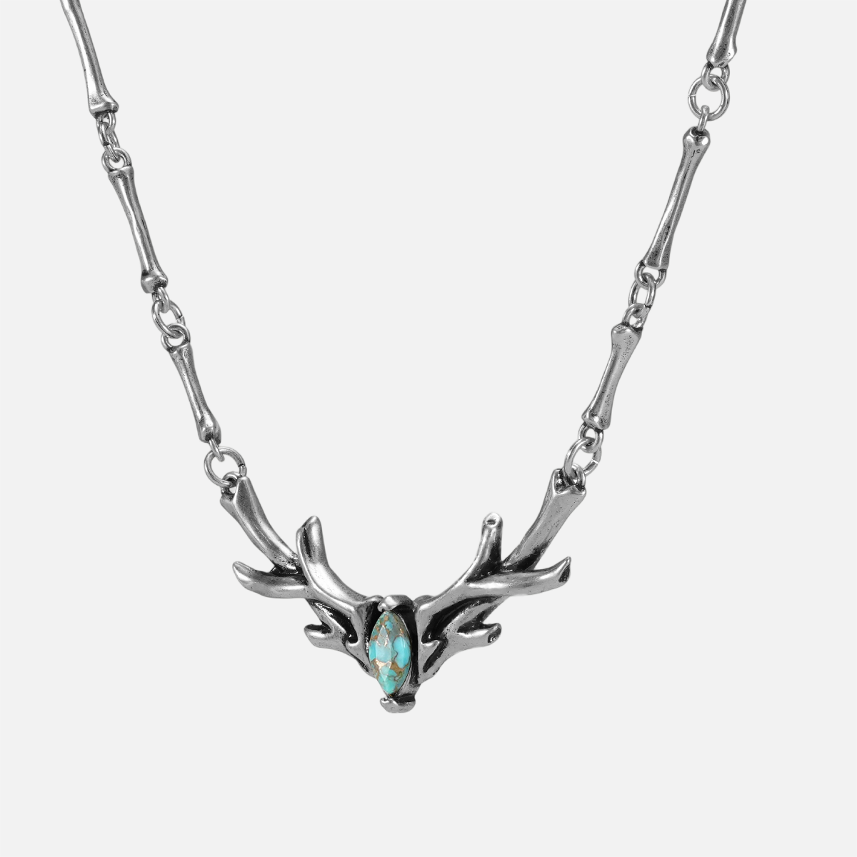 Silver Sacred Antler Collar Necklace with antler-shaped collar and turquoise marquise stone