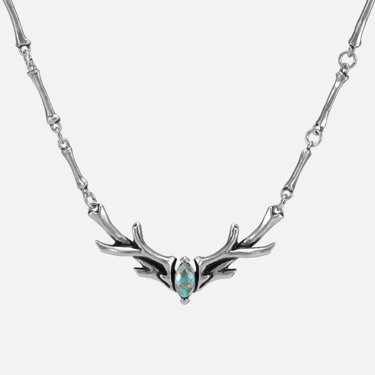 Sacred Antler Collar Necklace in silver plating with turquoise marquise stone and antler-inspired collar design