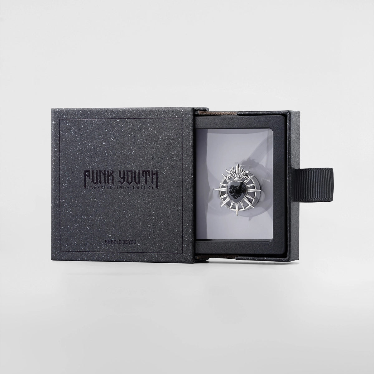 Silver Sacred Flame Heart tunnel presented in a black PUNKYOUTH jewelry box