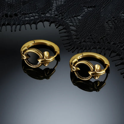 Gold-tone Scrying Mirror Hoop Earrings displayed from multiple angles against a dark reflective background.