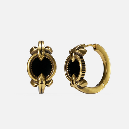 Gold-tone Scrying Mirror Hoop Earrings shown from front and side views with oval black obsidian inlays and pointed accents.