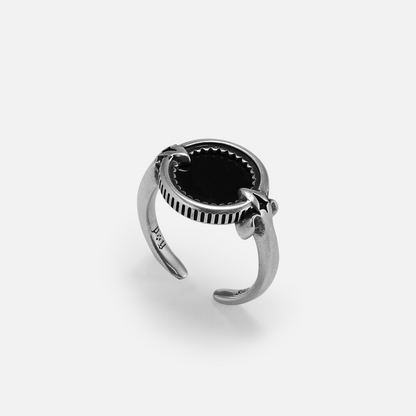 Antiqued 925 sterling silver Scrying Mirror Ring shown from an angled view with a round black obsidian center, pointed accents, and an open band.