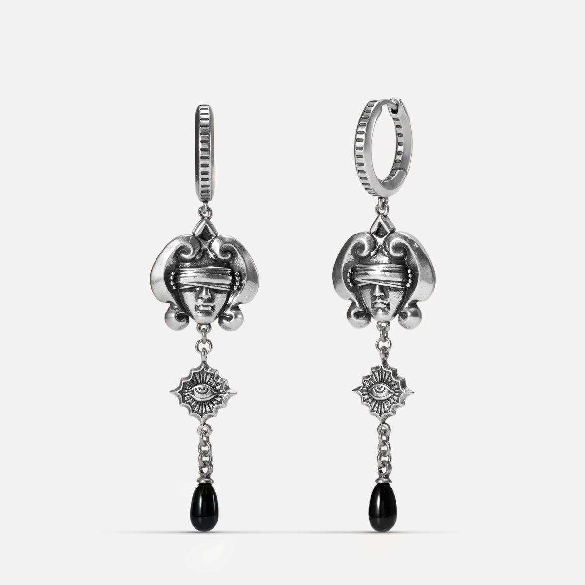 Antiqued silver-tone Second Sight Drop Earrings shown from front and side views with blindfolded face motifs, radiant eye medallions, and black teardrop accents.