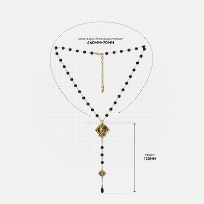 Size guide for the gold-tone Second Sight Lariat Necklace showing the beaded chain, central motif, drop, and overall dimensions.