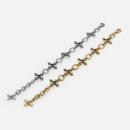 Silver and gold Silent Litany Bracelets extended side by side on white, showing the gothic link construction.