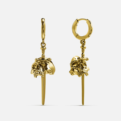 Gold-tone skull and dagger drop earrings with huggie hoops, front view pair