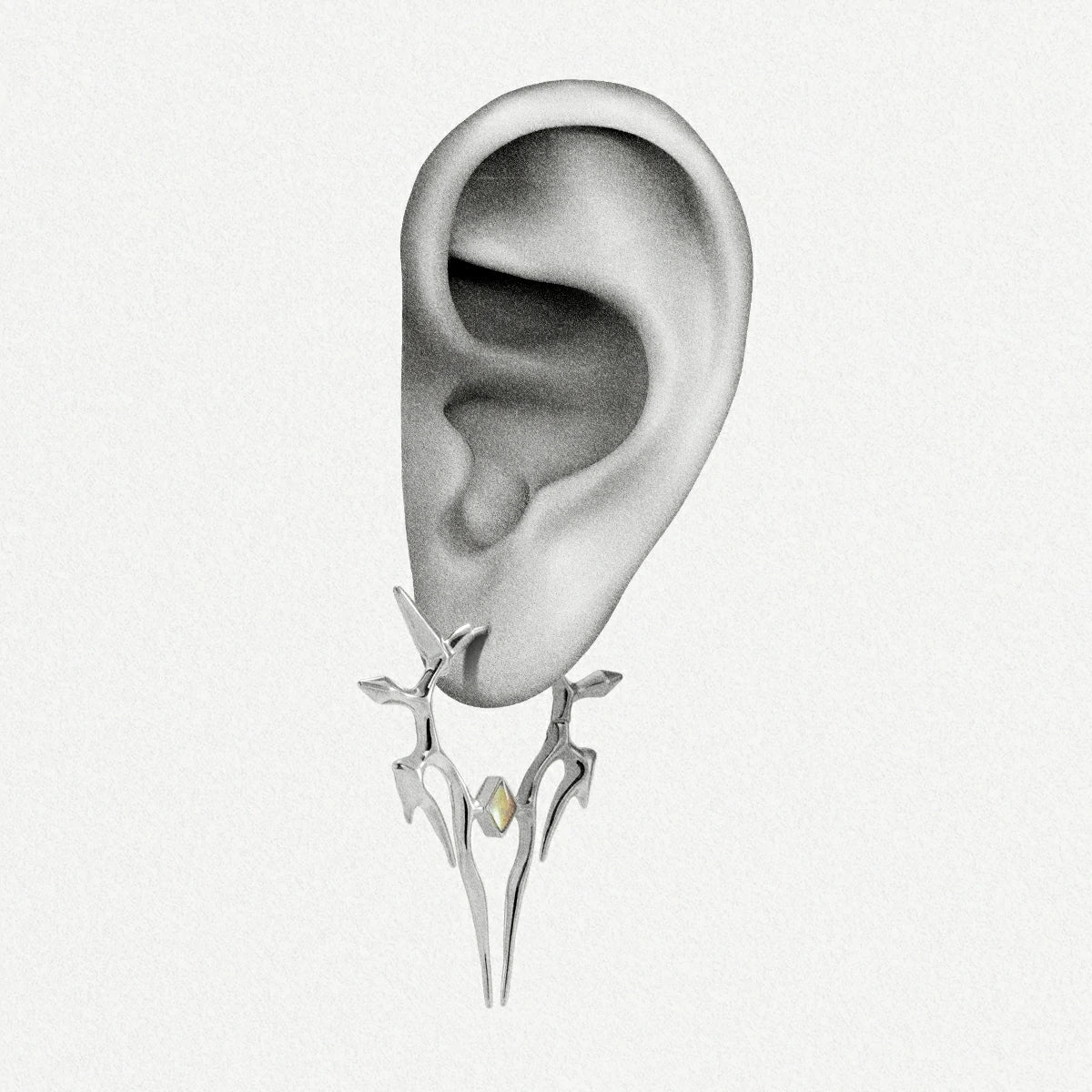 Silver Solar Guardian earring shown on an ear illustration