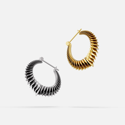 Silver and gold Spine Halo hoop earrings with rows of pointed ridges