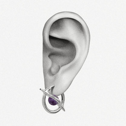 Silver Stellar Axis Earrings shown on ear placement with celestial axis frame