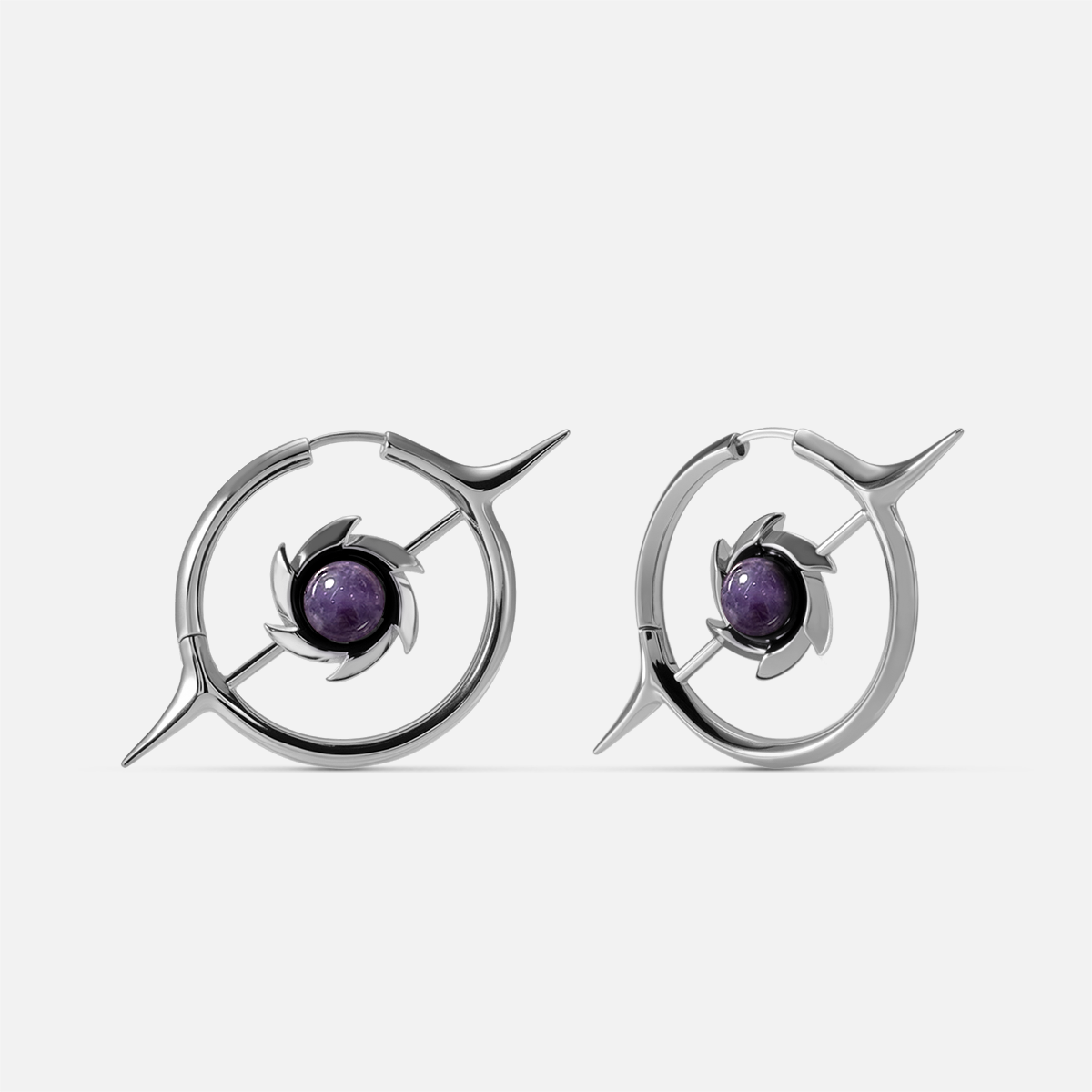 Silver-tone hoop earrings with a star-shaped pendant and round purple stone center, front view pair