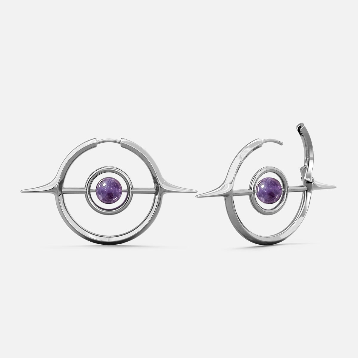 Silver-tone Stellar Grace hoop earrings with spike accents and a purple stone center, shown front and side view