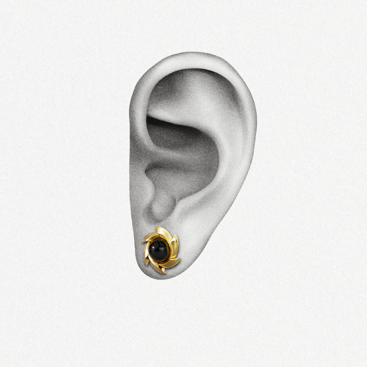 Gold Stellar Nova ear stud with black center shown on an ear illustration