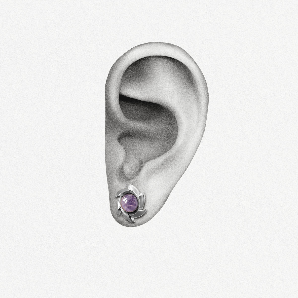 Silver Stellar Nova ear stud with purple center shown on an ear illustration