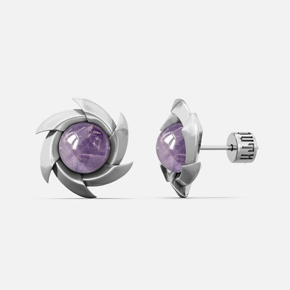 Silver-tone pinwheel stud earrings with a round purple stone, front and side view