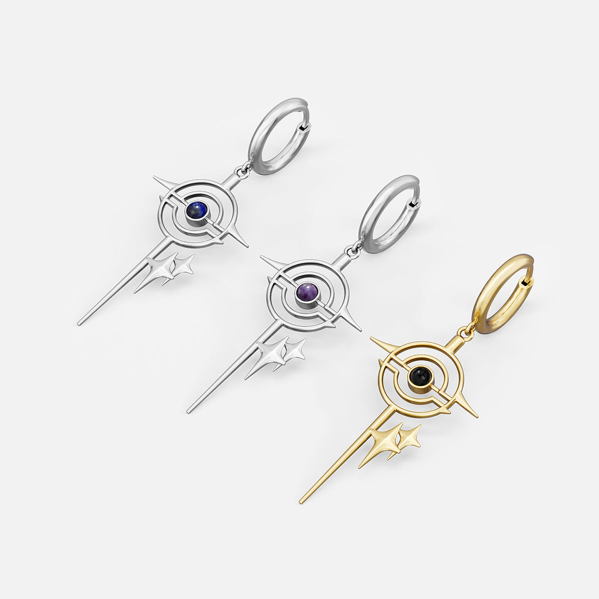 Silver and gold Stellar Path hoop earrings with blue and black center accents