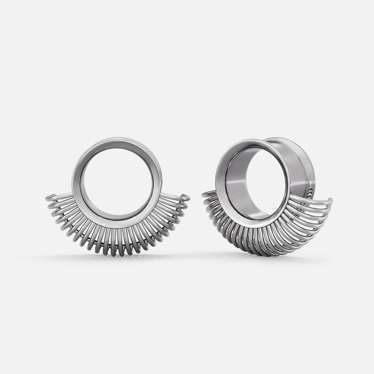 Pair of silver Symmetrical Radiance tunnels with fan-shaped lower ridges