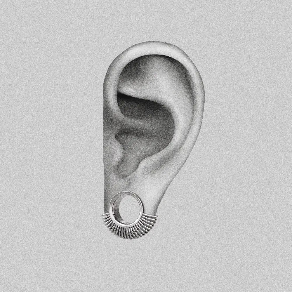 Silver Symmetrical Radiance tunnel shown on an ear illustration