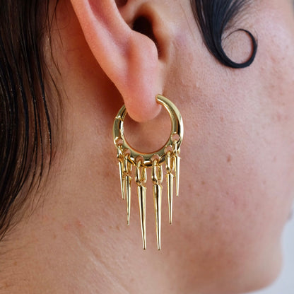 Close-up side view of a gold-tone Tapered Chic hoop earring with five graduated spike drops