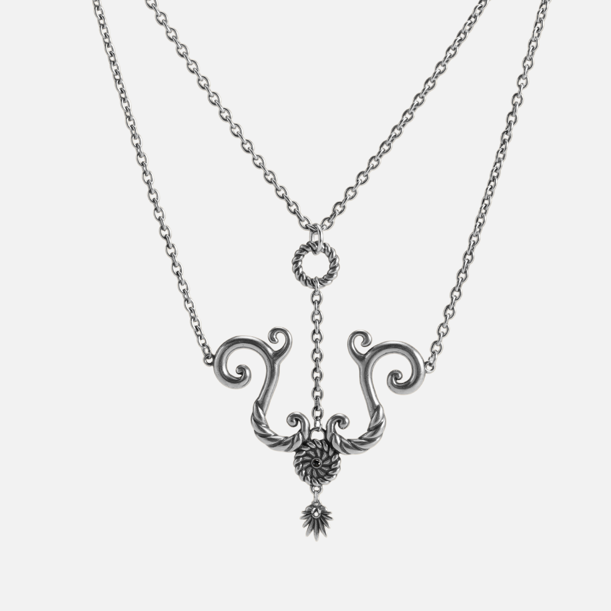 Tideworn knot necklace in antiqued silver finish with rope textured ring and layered spiral pendant