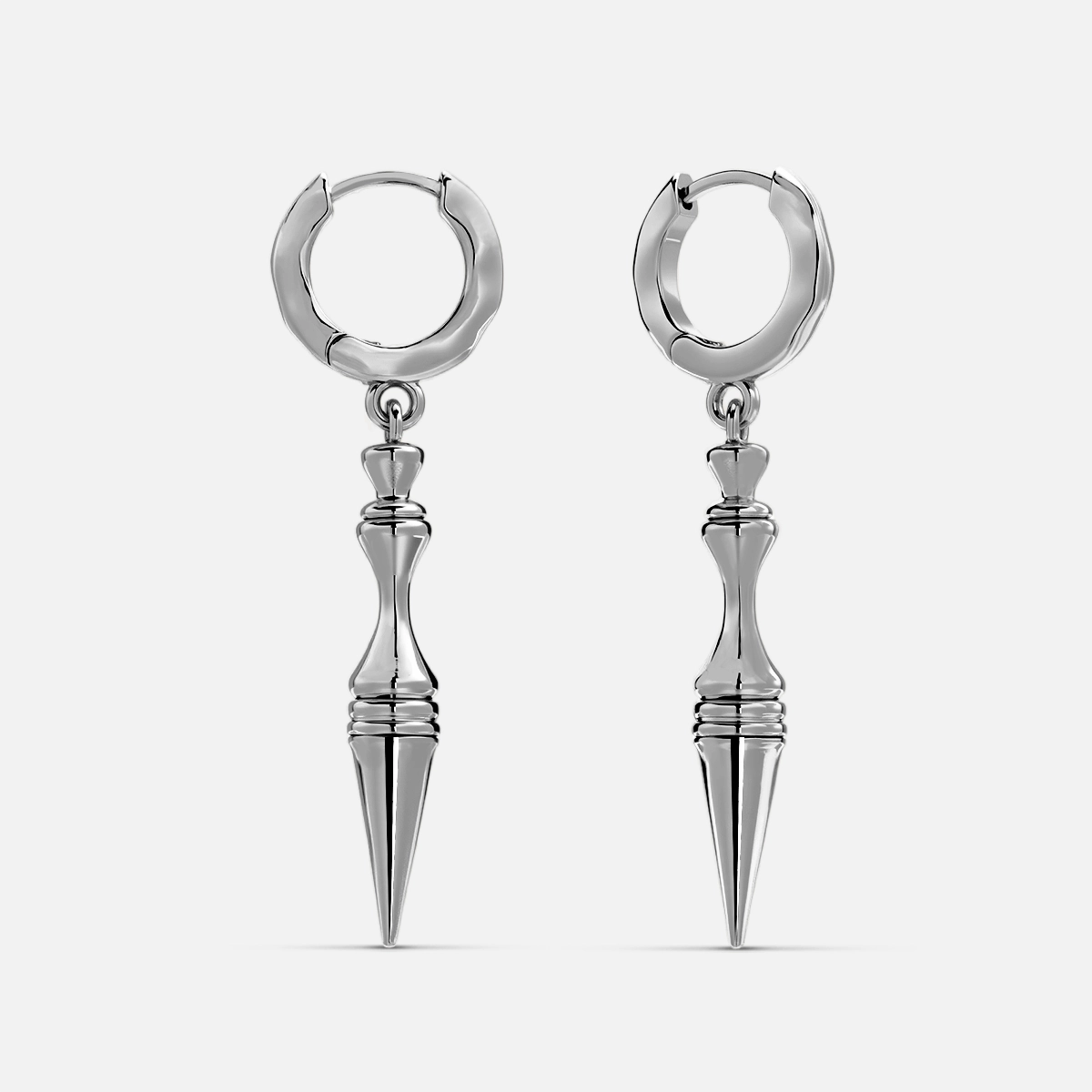 Silver-tone spear pendant hoop earrings shown as a pair against a plain background