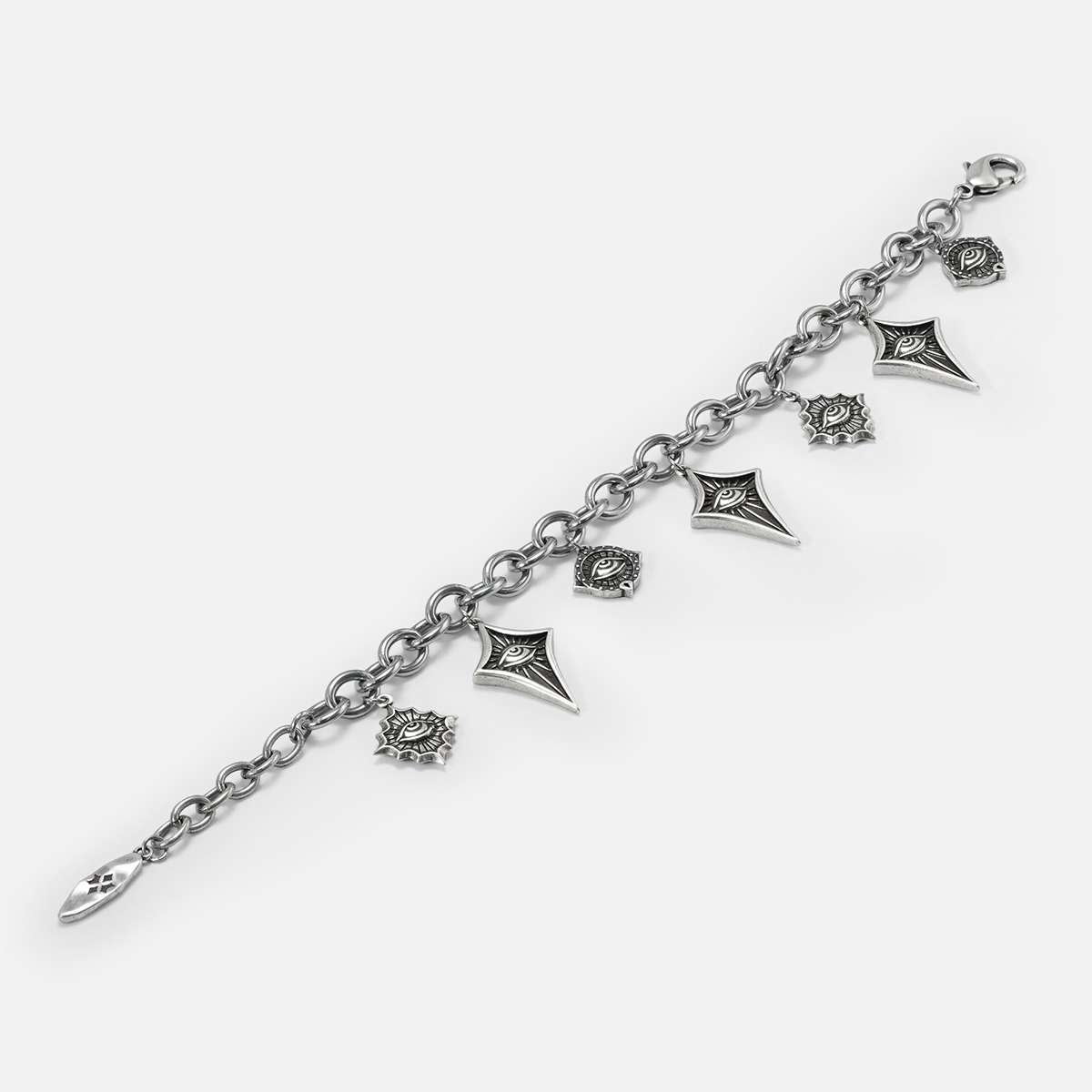 Antiqued silver-tone Unblinking Procession Bracelet displayed fully extended to show the link chain, clasp, and varied eye charms.
