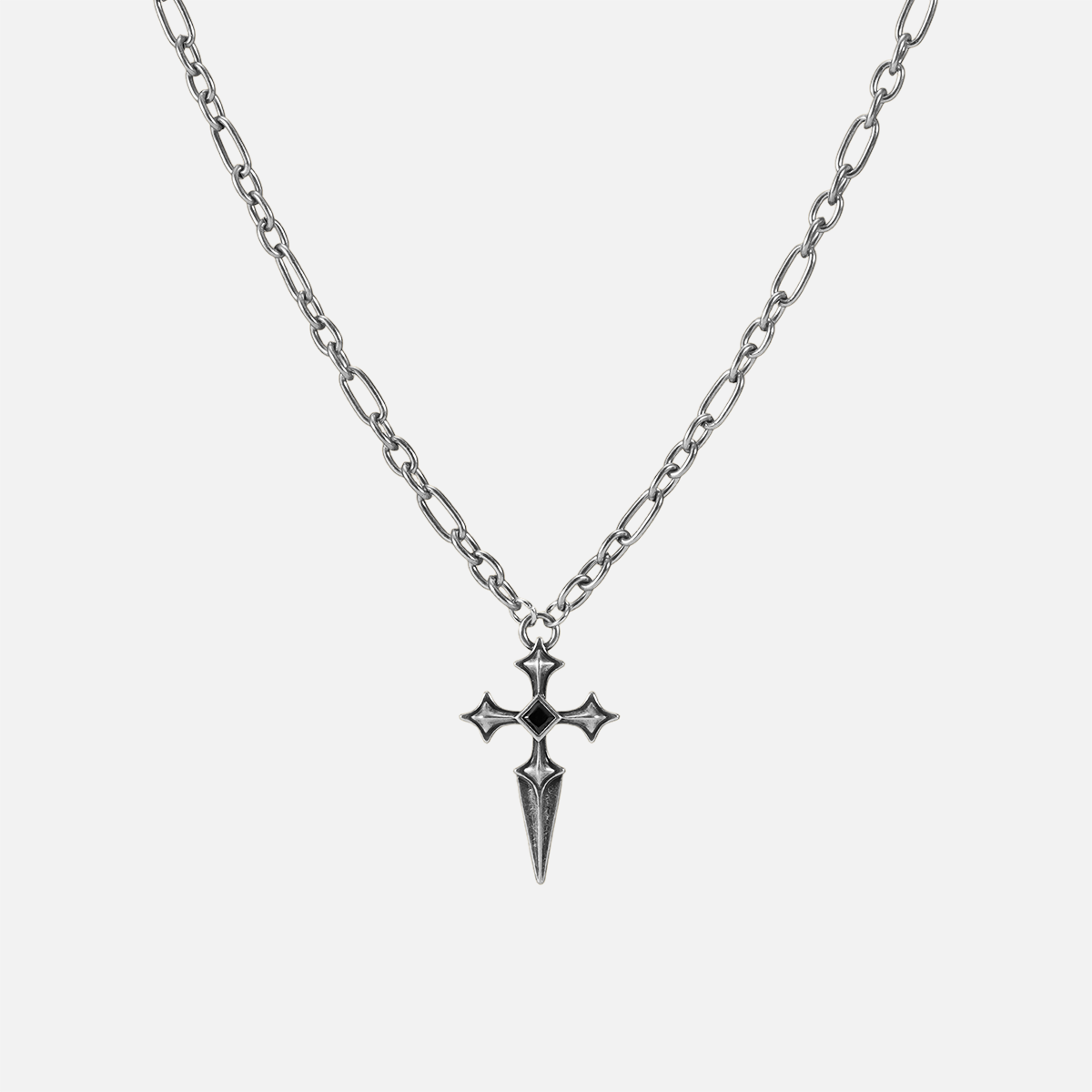 Vesper Blade Necklace in antiqued silver with a blade-shaped cross pendant and black obsidian, shown full length on white.