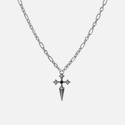 Vesper Blade Necklace in antiqued silver with a blade-shaped cross pendant and black obsidian, shown full length on white.