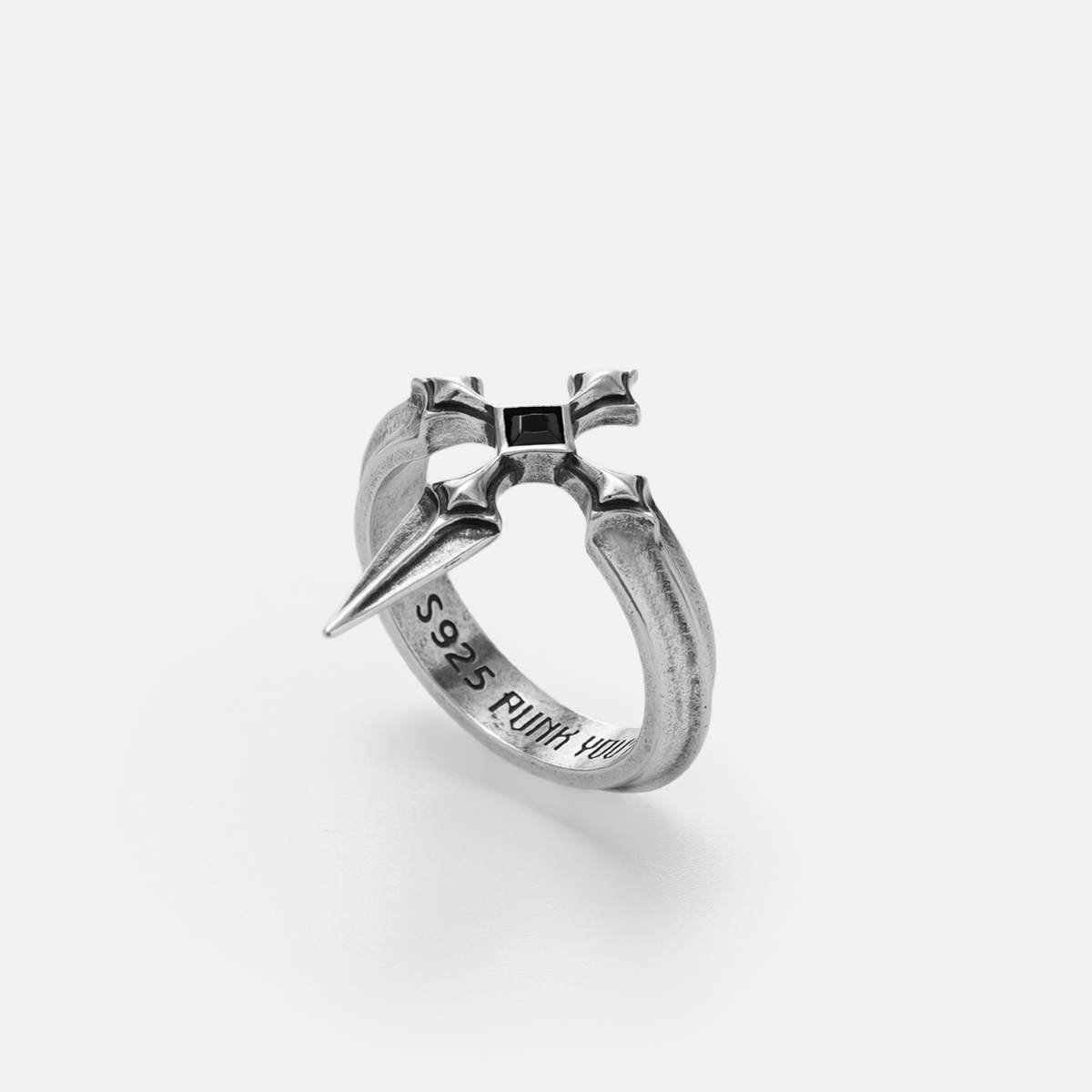 Vesper Blade Ring in silver shown at a three-quarter angle on white, highlighting the gothic blade and cross-inspired form.