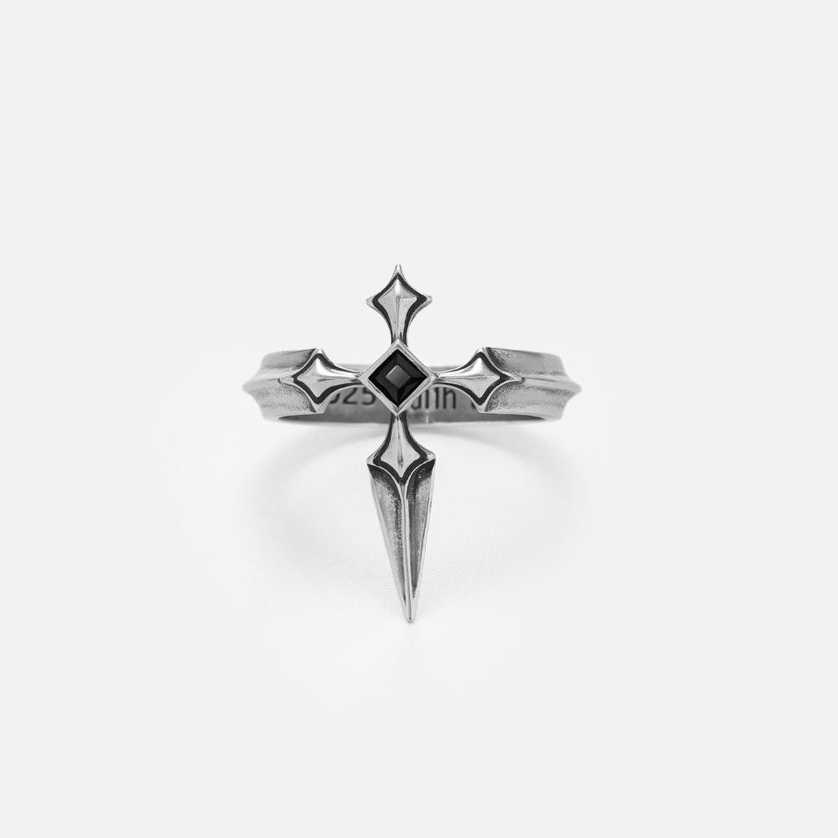 Vesper Blade Ring in silver shown from the top and front on white, highlighting the cross-inspired center setting.