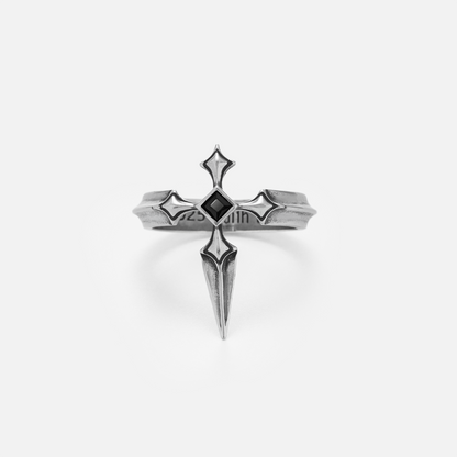Vesper Blade Ring in silver shown from the top and front on white, highlighting the cross-inspired center setting.