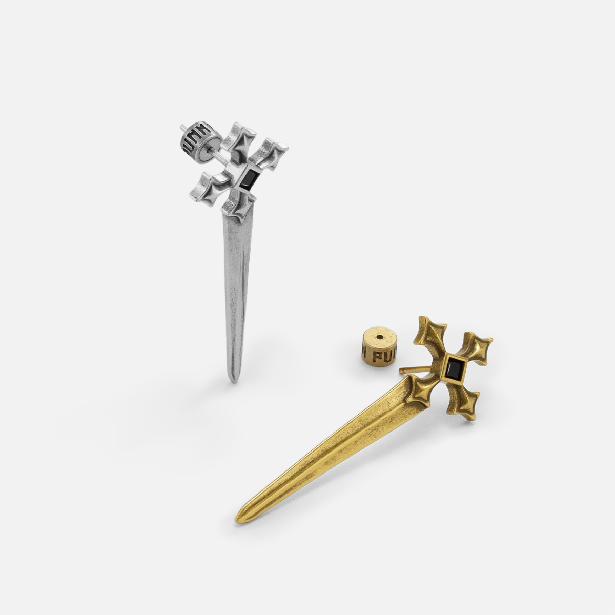 Silver and gold Vesper Blade Stud Earrings arranged at angled front and back views on white.