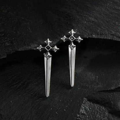 Silver Vesper Blade Stud Earrings displayed as a pair on black textured fabric.