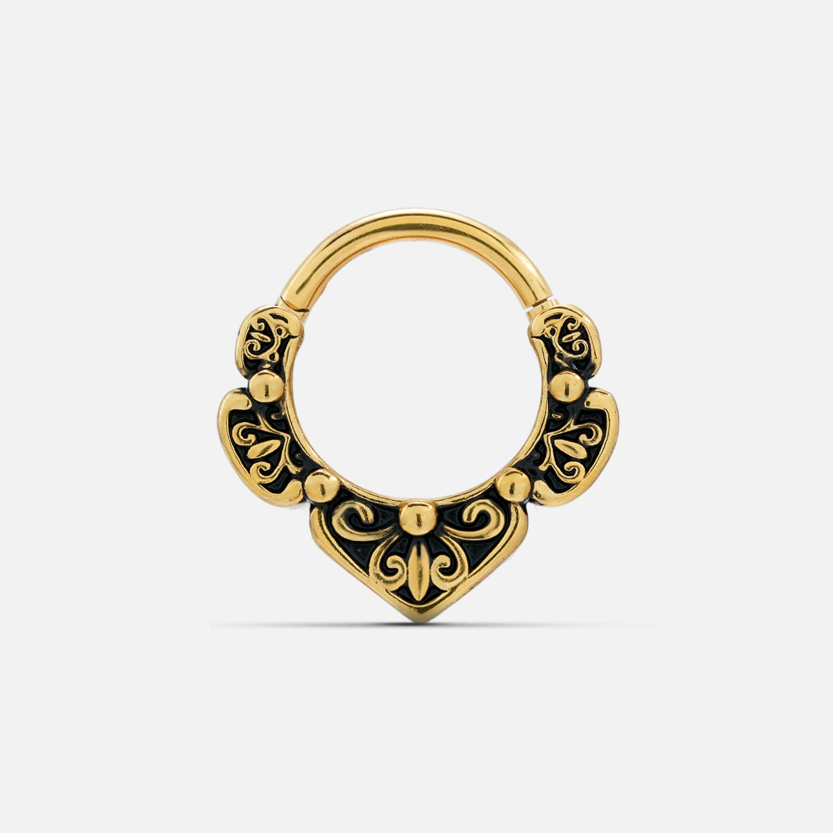 Gold-tone Victorian Bloom septum clicker with black recessed accents and ornate symmetrical scrollwork