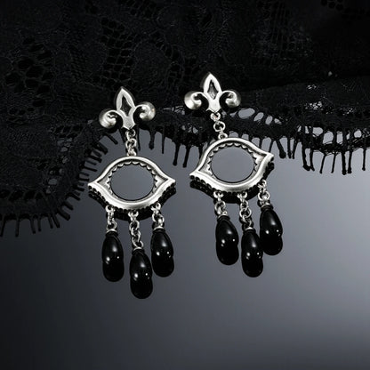 Antiqued silver-tone Votive Mirror Earrings displayed as a pair against black lace on a dark reflective surface.