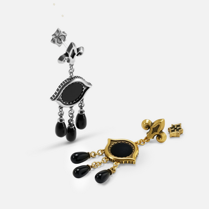 Antiqued silver- and gold-tone Votive Mirror Earrings displayed from angled views to show the eye-shaped frames and suspended black drops.