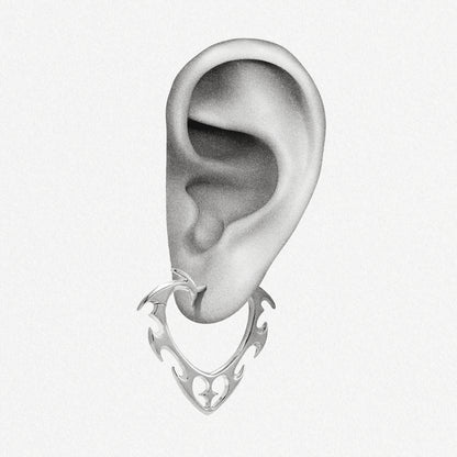 Silver Wild Heart earring shown on an ear illustration