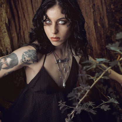 Wrapped Relic Necklace styled in a dark forest portrait with witchwood inspired jewelry mood